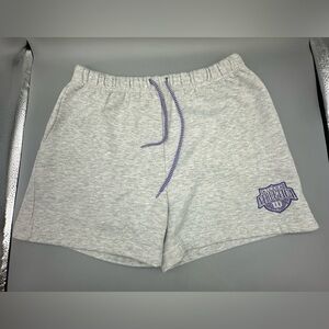 Wilson shorts with a purple drawstring / Wilson Athletica logo -Woman’s
